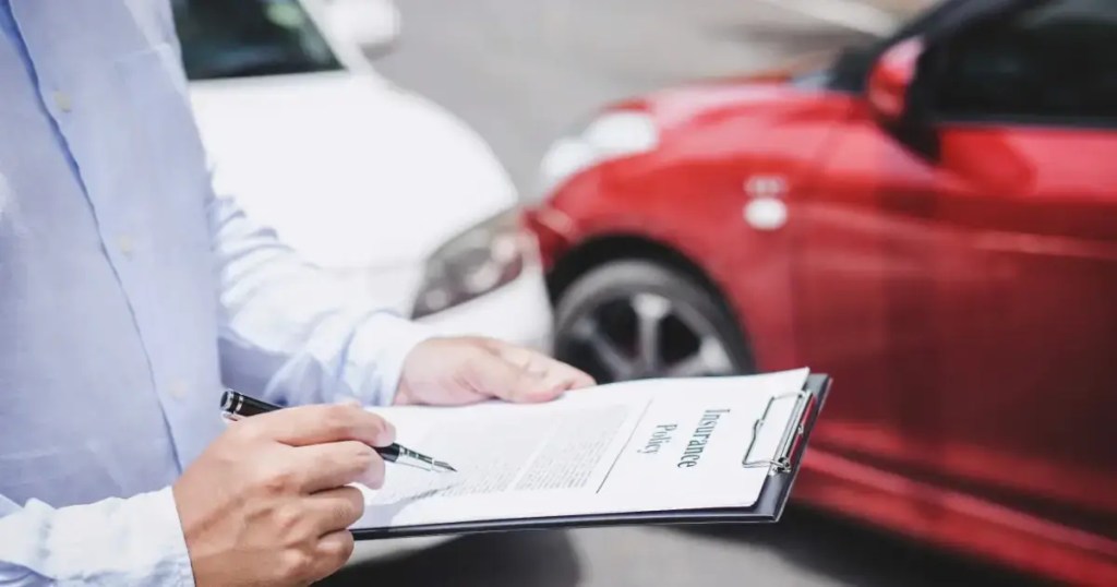 Insurance estimate paperwork for collision repair after a vehicle accident
